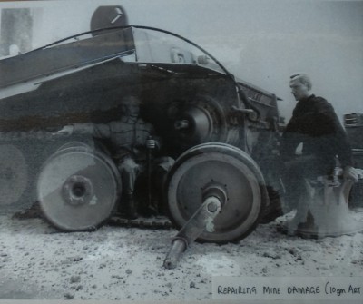 This photo would show the fracture to the cast swing arm but the quality is poor as it's a photo of a photo.