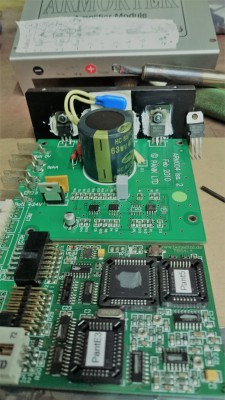 The power transistors for those that are not familiar are the three legged components on the heat sink at the top