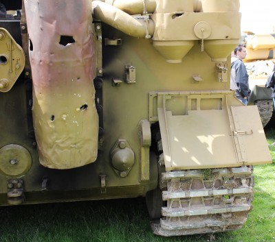 Nice example of a very hot exhaust shield caused by an off side bank of cylinder burning fuel outside the combustion chambers , giving a very interesting patina.