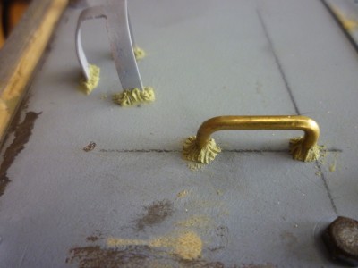 Bent brass handles