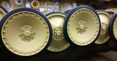 I would say that you need to keep the paint away from the hub cover thread areas and use a soft wire brush to buff the threads with a smidge of light oil to prevent the ali on ali picking up