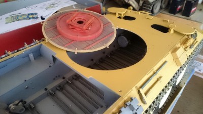 It's just a case of undoing around eight M3 bolts and the flak mount table lifts away.