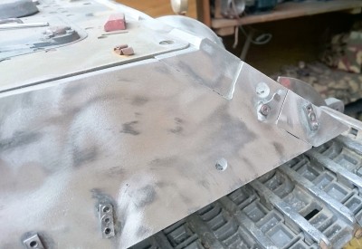 It's a little easier to strip the small parts of paint while they are held in place. I can now see the armour fixings under the filler, a little heat and the allen wrench will just slip into the cap head, the gentle heat will also help release the thread without breaking the bolt off.