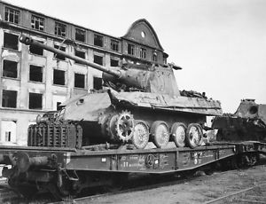 Damaged Panthers on 2 axel (rather than the usual 3 axel) bogie rail cars.