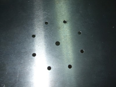 Holes for round access panel