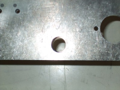 O ring sticking out on one side of the hole.