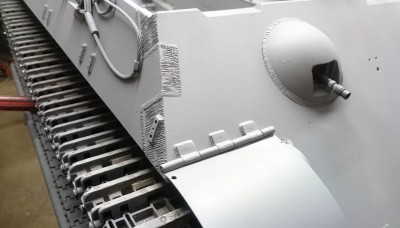 The front fenders, slim front fenders show cases those lovely tracks and sprockets.