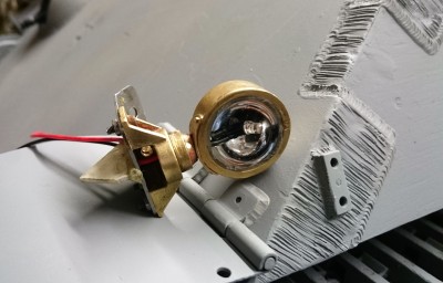 I have replaced the filament bulb with an LED, less heat.