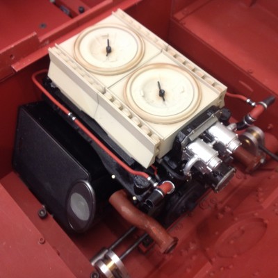 The engine in place above the speakers