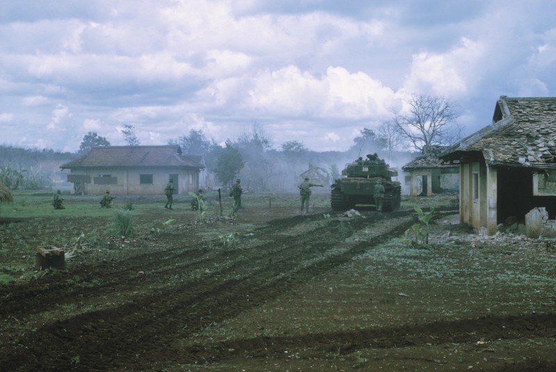 Tanks and infantry assault the village