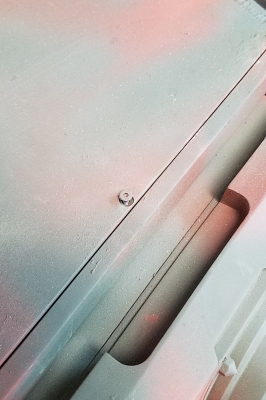 Drilled and tapped for 3mm machine screw in front roof center.