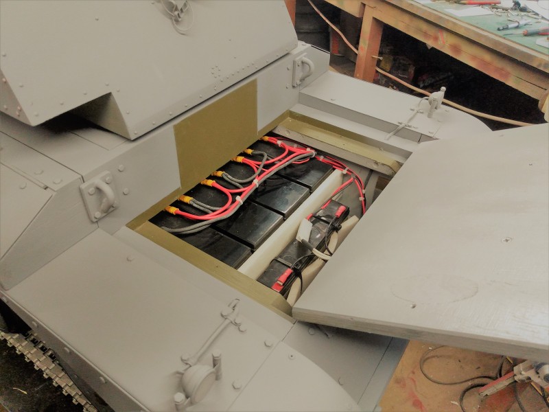 Good battery and track tension idler adjuster access