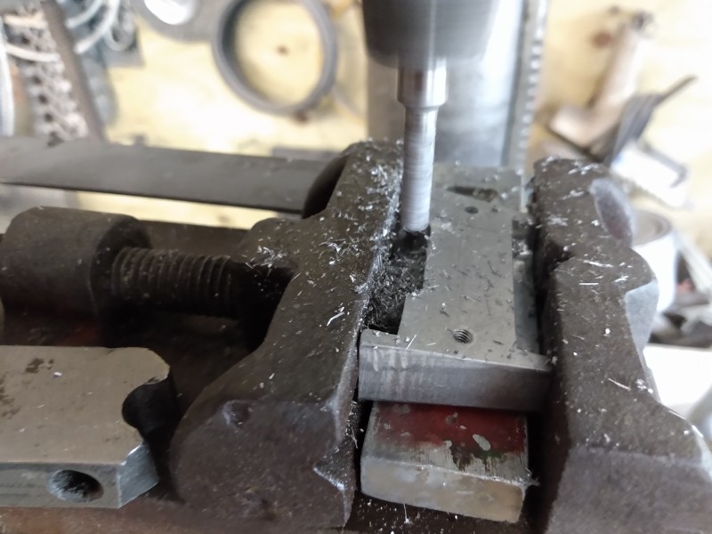 Milling the loaders view port armour to accept the periscope.