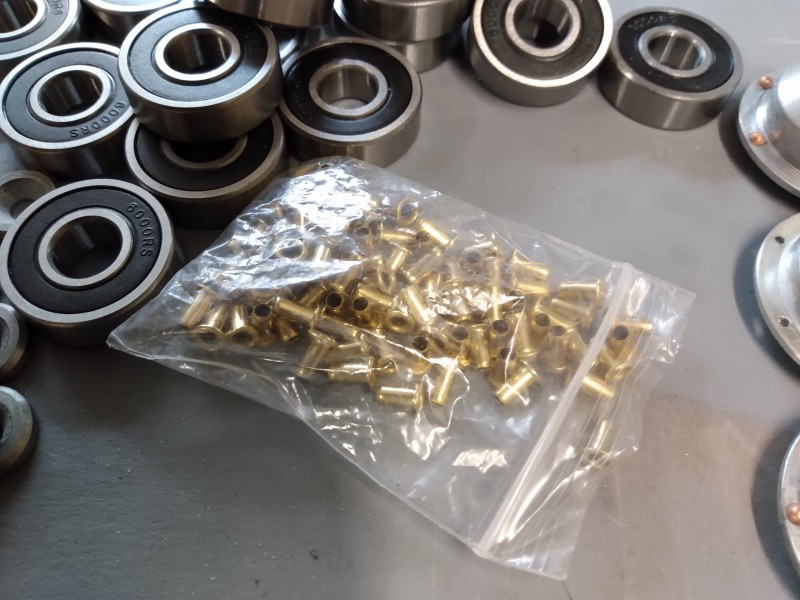 Don't ask me where I found these little brass dodads but they sure do look the part. I can tell you what they look like, and that's servo mount rubber inserts.