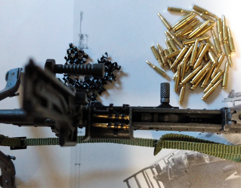 A perfect fit in the GPMG's oily bits. Even the weapons link extractor block is in the right place.