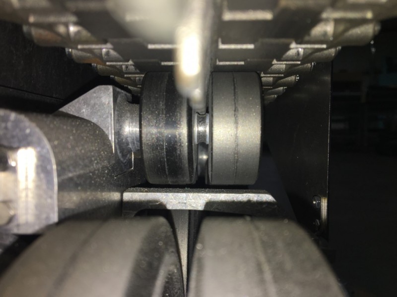 CHANNEL CUT INTO THE RETURN ROLLERS