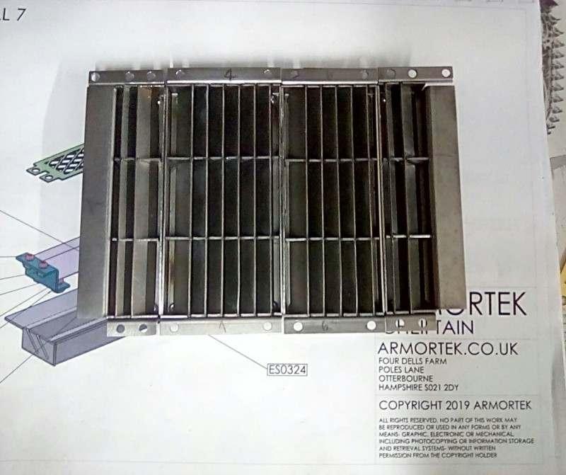 May I suggest that you align all the hatch louver divisions whilst it's all on the bench of you will have a hell of a job.