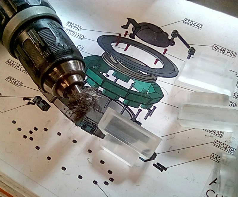 I'm using fine grade wire wool in a drill Chuck to polish the periscope outer face.