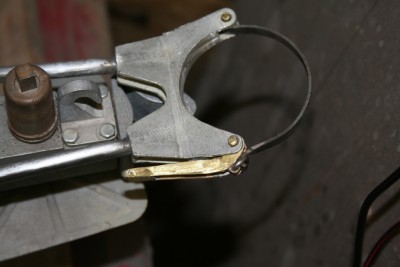 Gun travel lock spring/handle