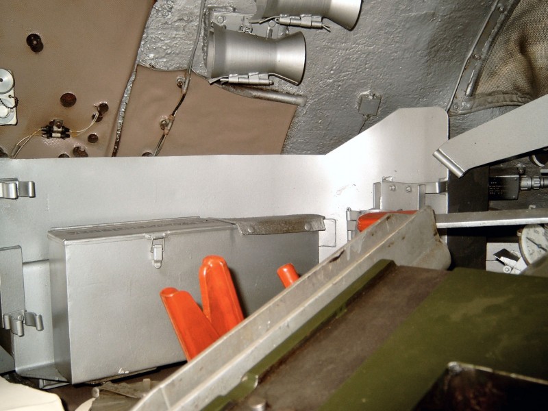 Can anyone identify this area of the turret please? I would say loader as it's left of the breech and there's plenty of room, also what are the conical fittings at head height, and the Orange handles?