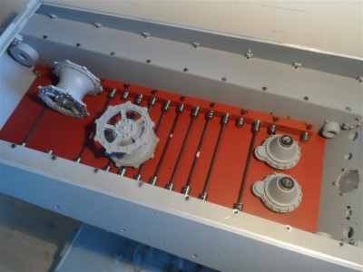 The two sprockets and drive case with gear, just sprayed with primer