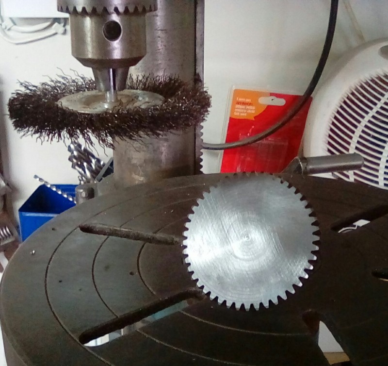 Deburring and polishing the main drive gears, this makes it super smooth.
