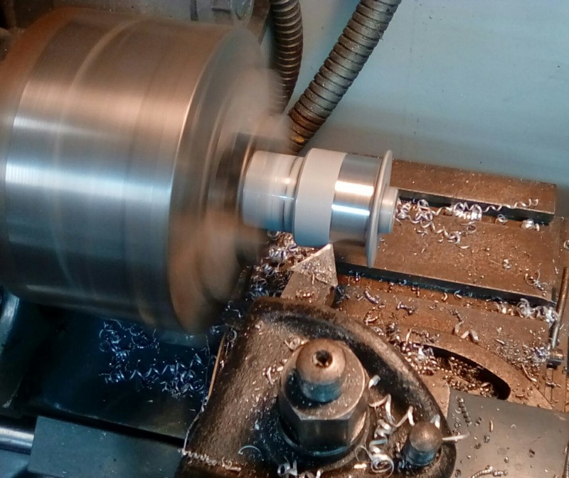 Turning down the spacers to the road wheel outer axle diameter, this also gives more clearance between the opposing axles.