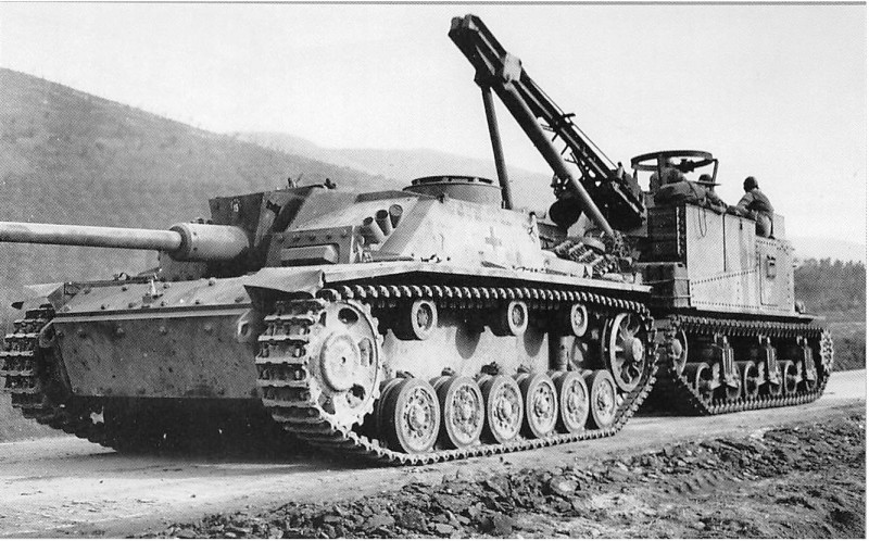 StuG III being recovered by an M3-based T2 recovery vehicle.jpg