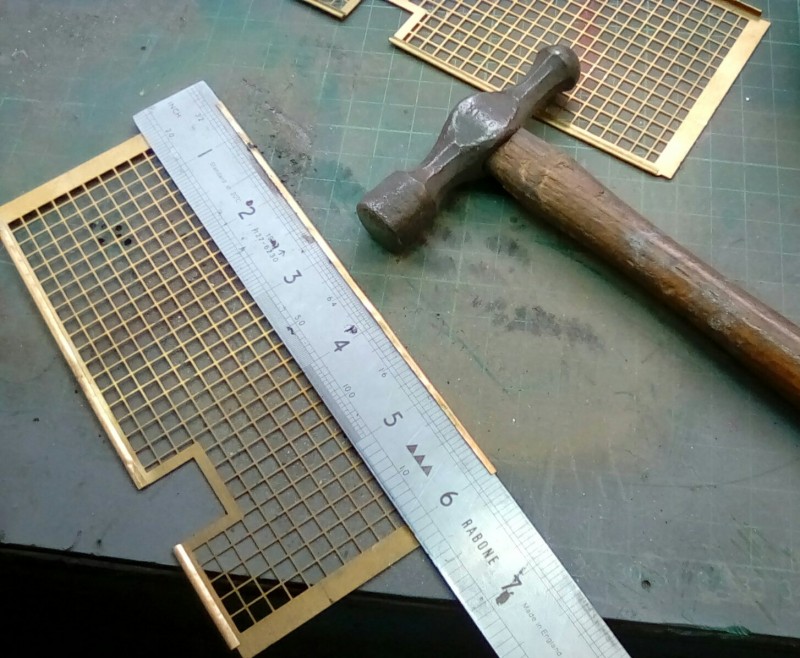 Rolling the edges of the etch sheet.