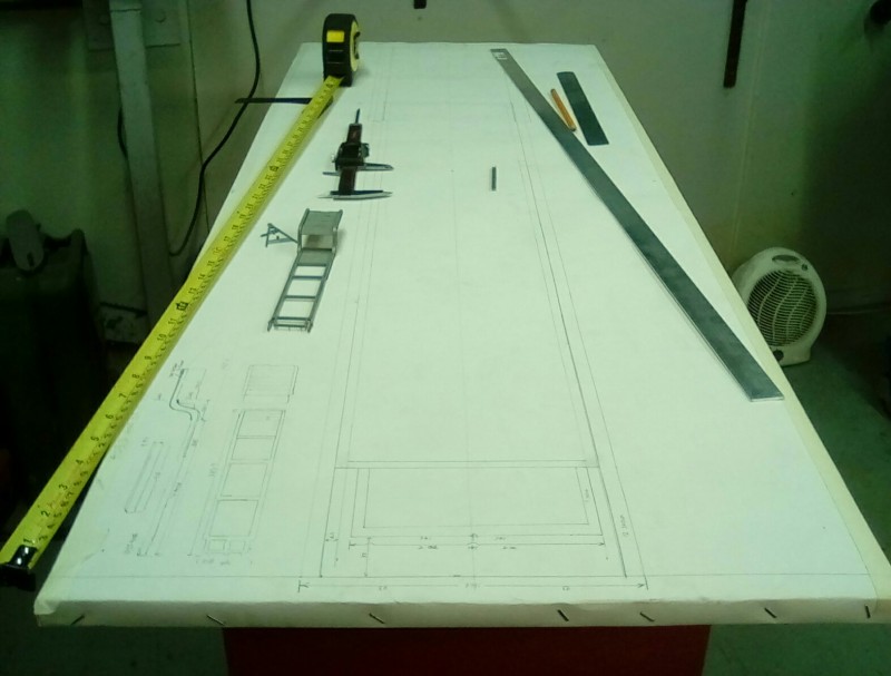 It's awfully big, this plan table isn't quite big enough to include the drawbar and the rear axle .