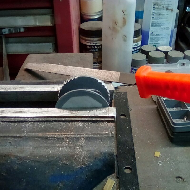 Hand filing the working winch ratchet.