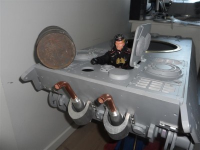 The left thing is Dragon Metal Oil Fuel Drum Barrel, just buy this on Ebay with large camouflage net.