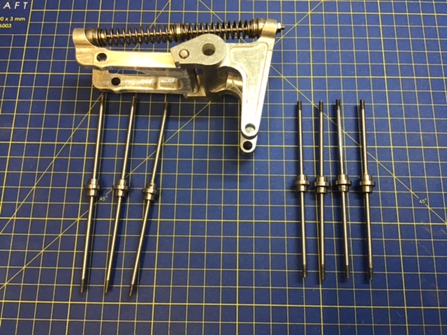 The modified spring rods, when the suspension articulates the rod should now be displace equally in both directions