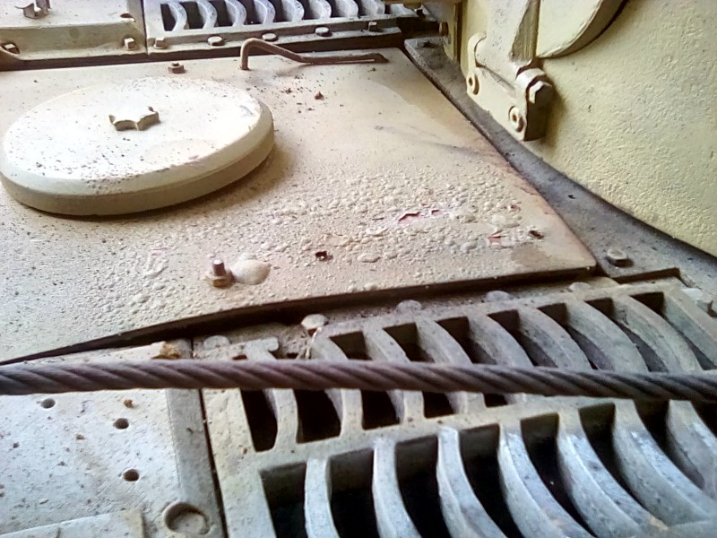 The engine hatch has been deformed, one of the lifting handles has been crushed as the hatch impacted the turret kit box, and the other is now in space!