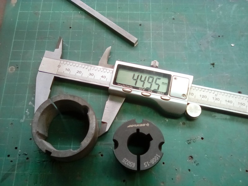 I did find this machined taper lock insert which I could have used, you simply bore a parallel hole and fix in place.