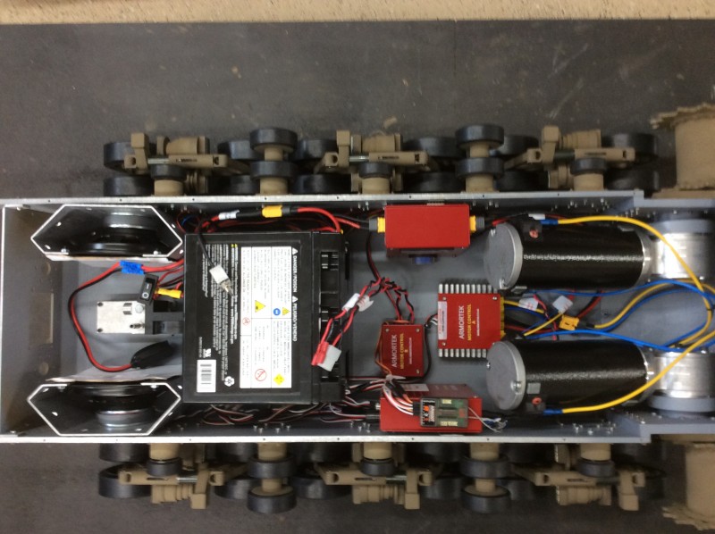 Everything is this pic is held down with velcro. The two leads at the front of the batteries go to the elevation and turret motors. At the back of the batteries are the power switch, smoke switch and charging lead. The switches will be permanently mounted later.