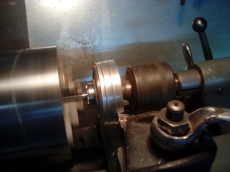 Turning the flywheel so it's true and balanced to the drive shaft. This Rolls Royce should run like a sewing machine.