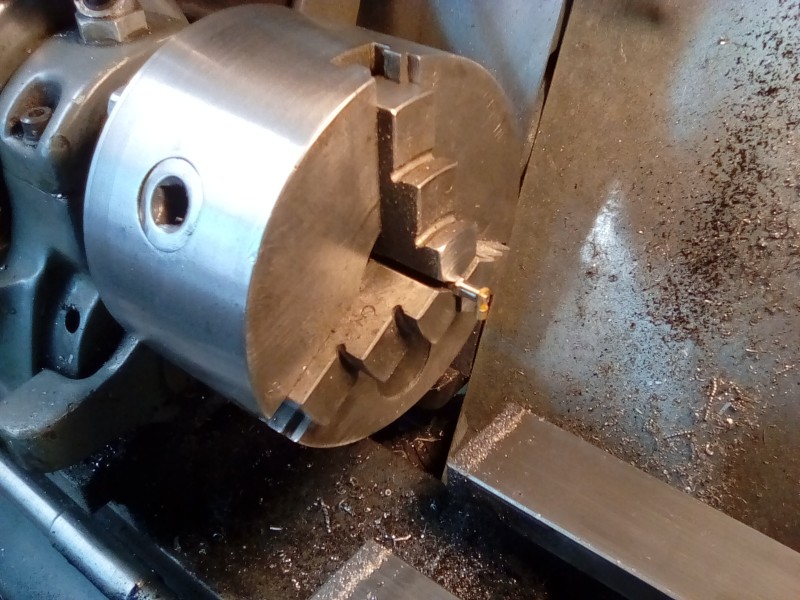 Turning the spark plugs to accept the ht lead caps.