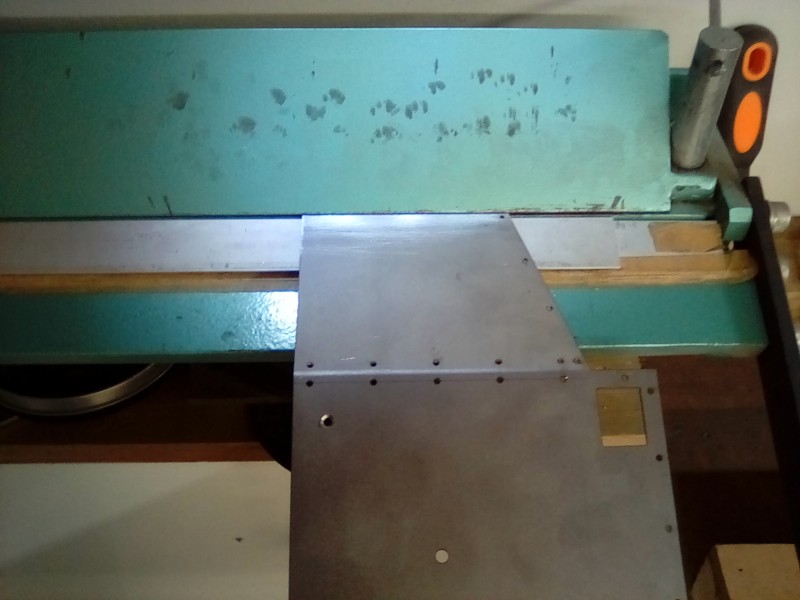 Bending the freshly cut sides to meet the firewall profiles.