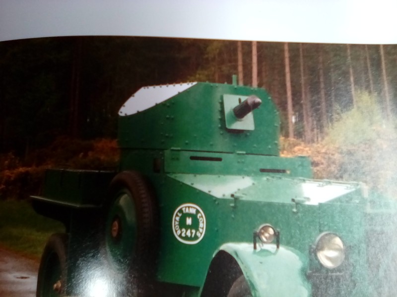 Note the difference in height of the driver view port on the later vehicles.