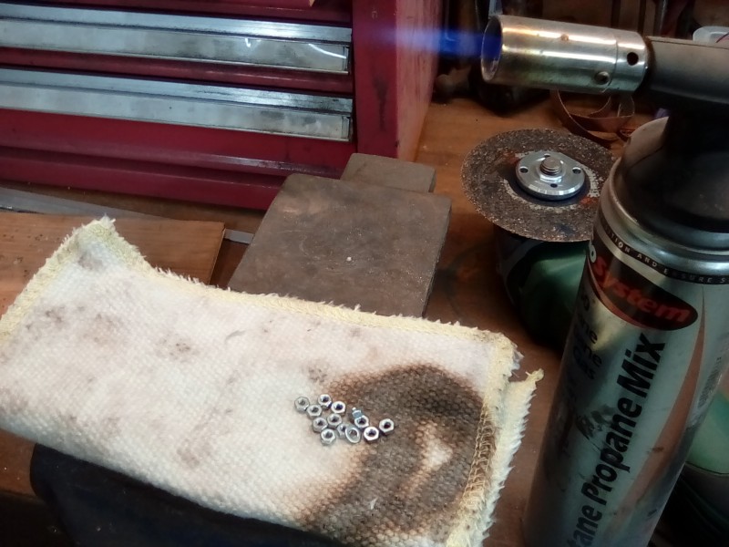 Debrightening the new m3 nuts.