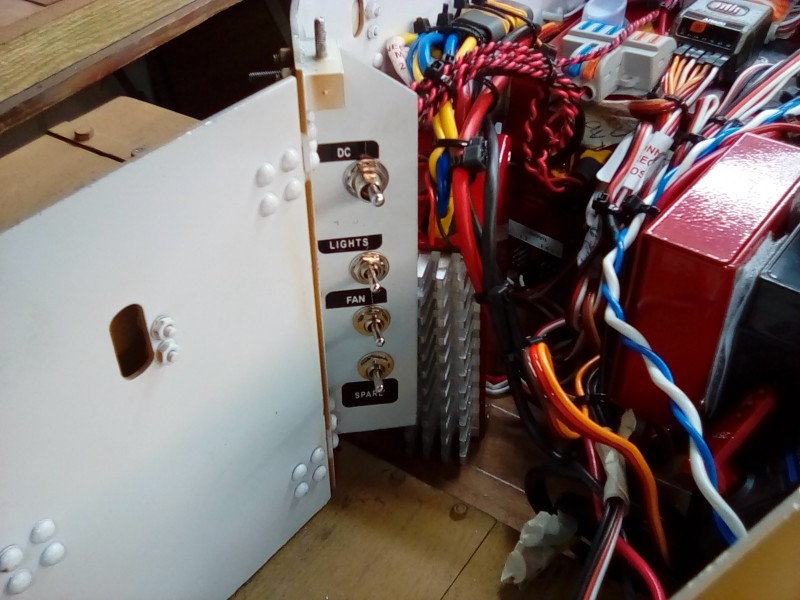 Switches for main power, running lights and radiator fan.