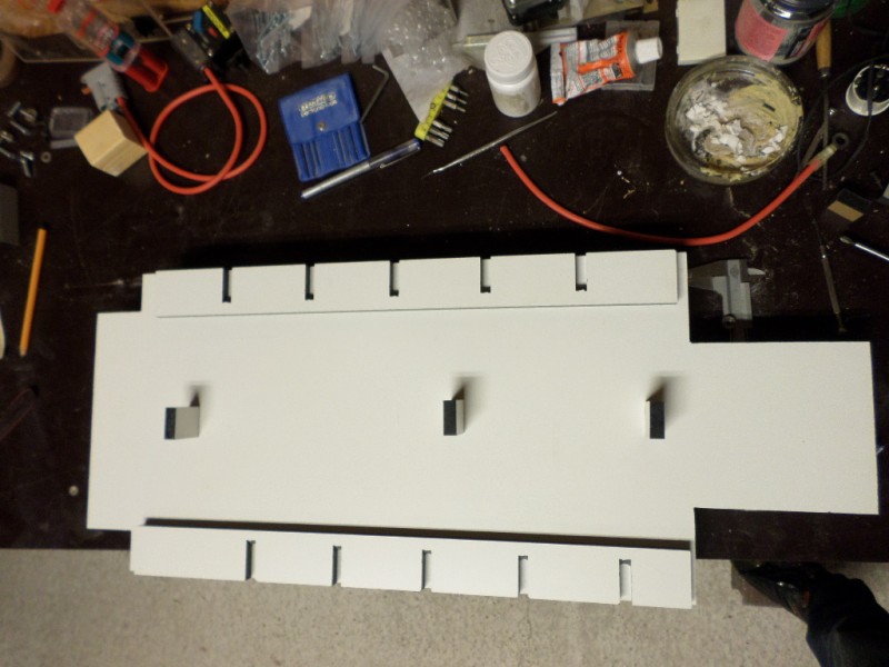 Underside of the base plate, with the slotted strips.