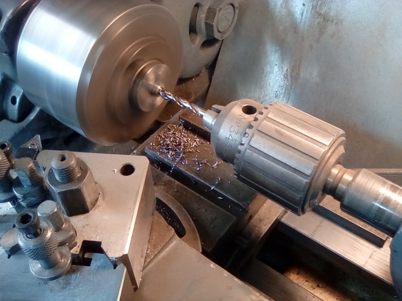 Drilling out the hull mg to accept the red led.