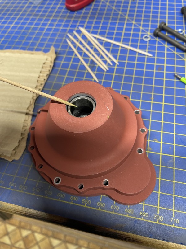 then using a drop of loctite on the inner bearing (outer on outside)applied with cocktail stick