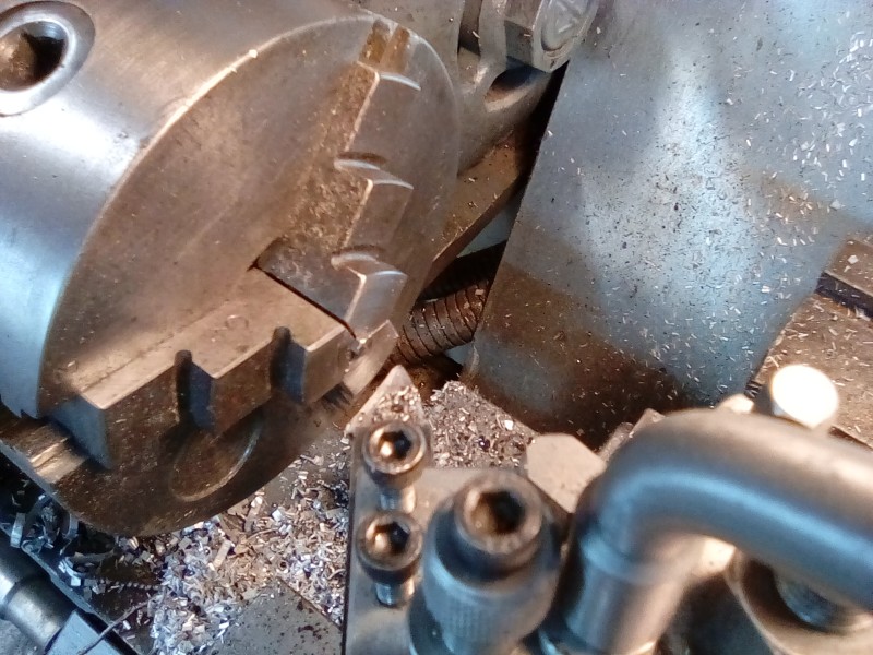 Turning down m2 bolt heads so they don't interfere with each other.