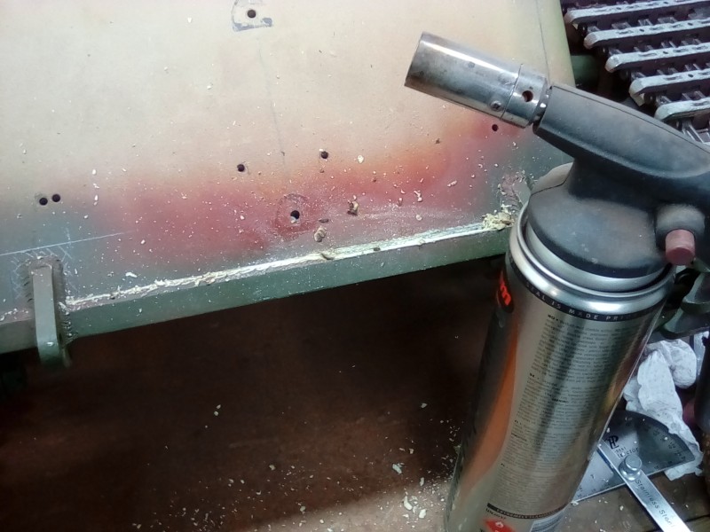 Removing the milliput welds with a little heat.