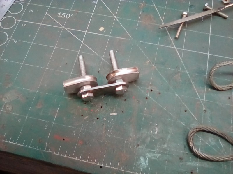 A new more correct link in steel, I really don't like brass fittings on these models.