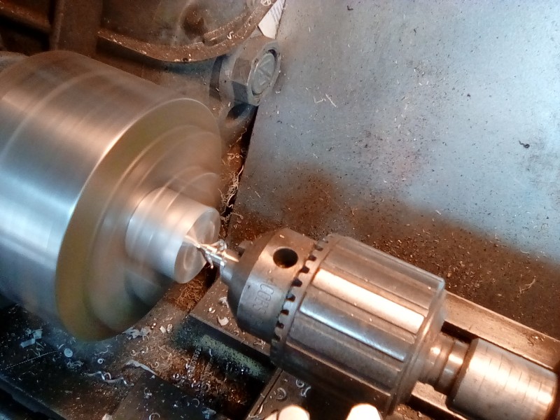 It's always advisable to center drill whilst in the lathe, I can then easily pick up that center in the rotary Chuck on the mill.