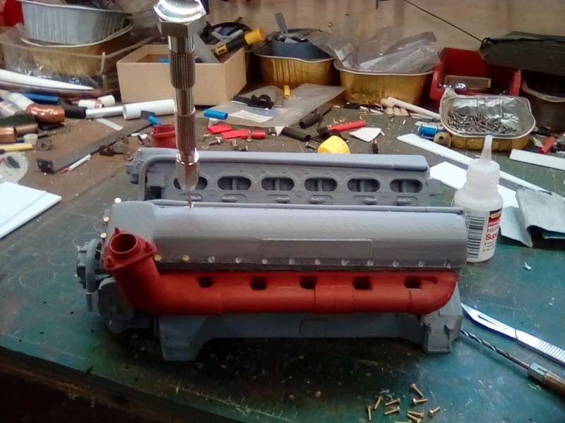 Whilst the paint is drying on the drivers compartment I shall get on with a few rocker cover bolt details